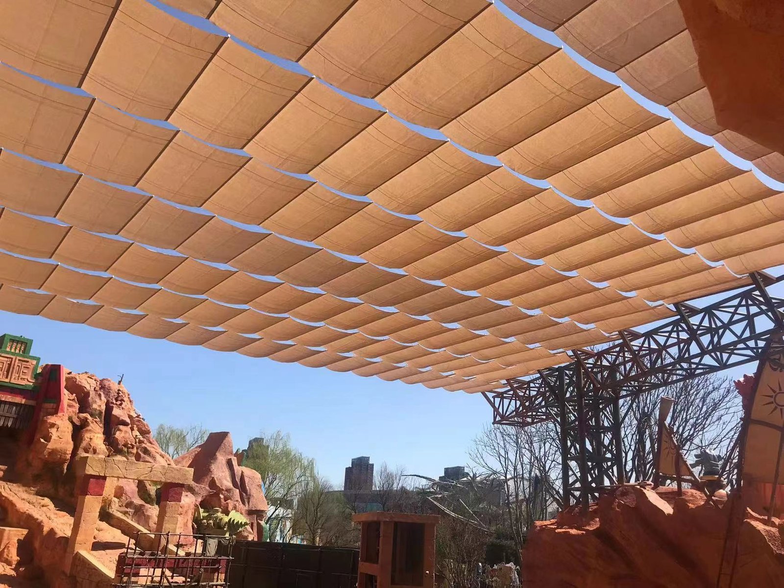 retractable shade canopy wave-like folds